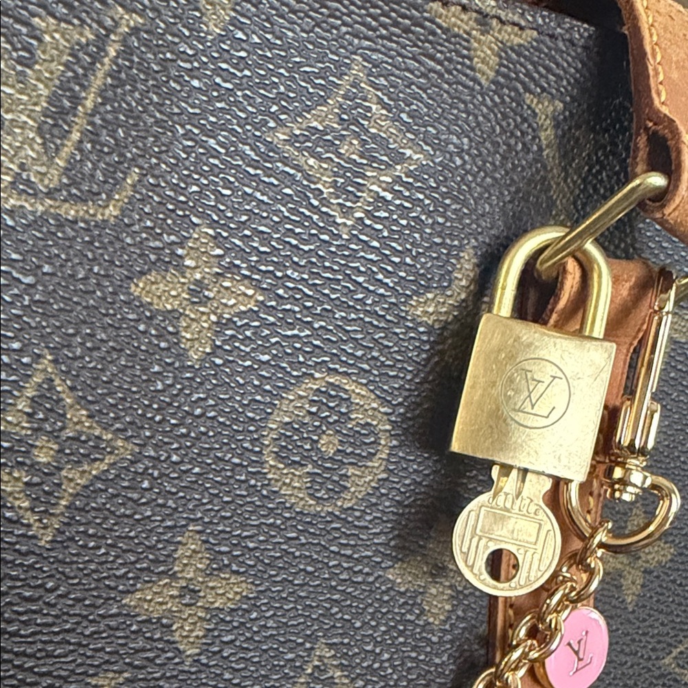 Louis Vuitton gold lock and key